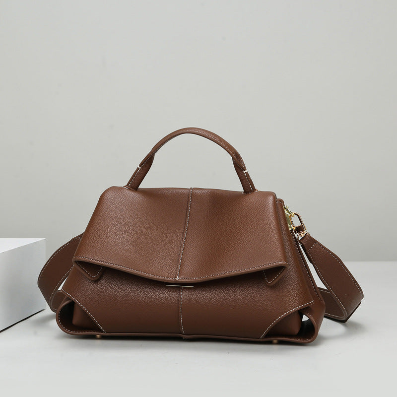 Elegant Langry French special design brown leather fashion handbag with flap closure and adjustable strap