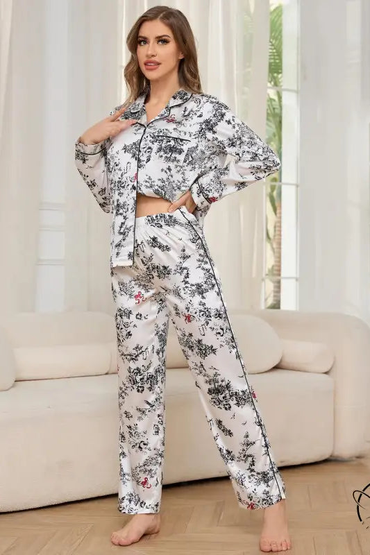 Woman in black and white floral winter long sleeved trousers home wear set