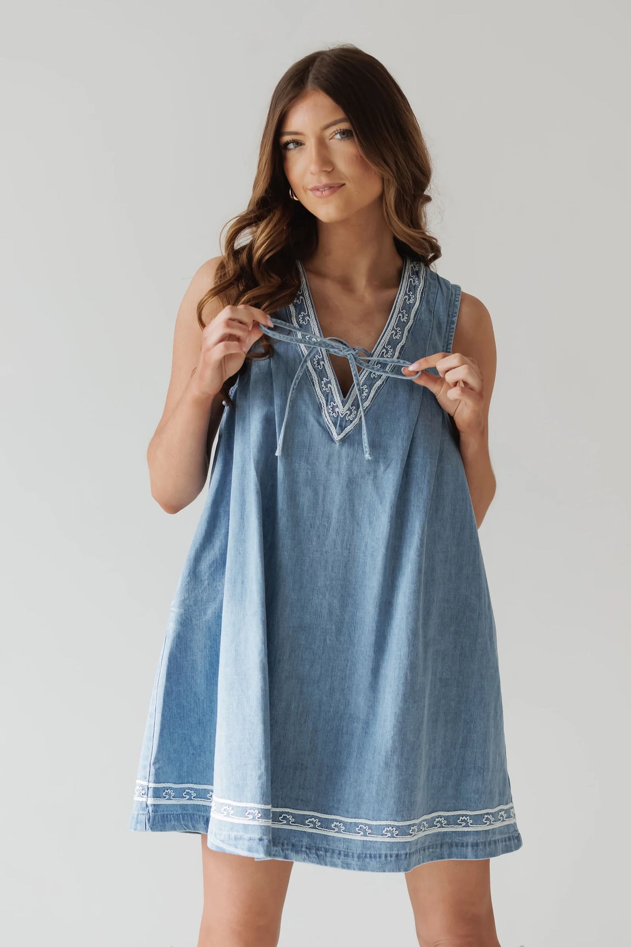 Blue denim dress with white trim from Beautiful Embroidered Vest Denim Dress in fashion ملابس