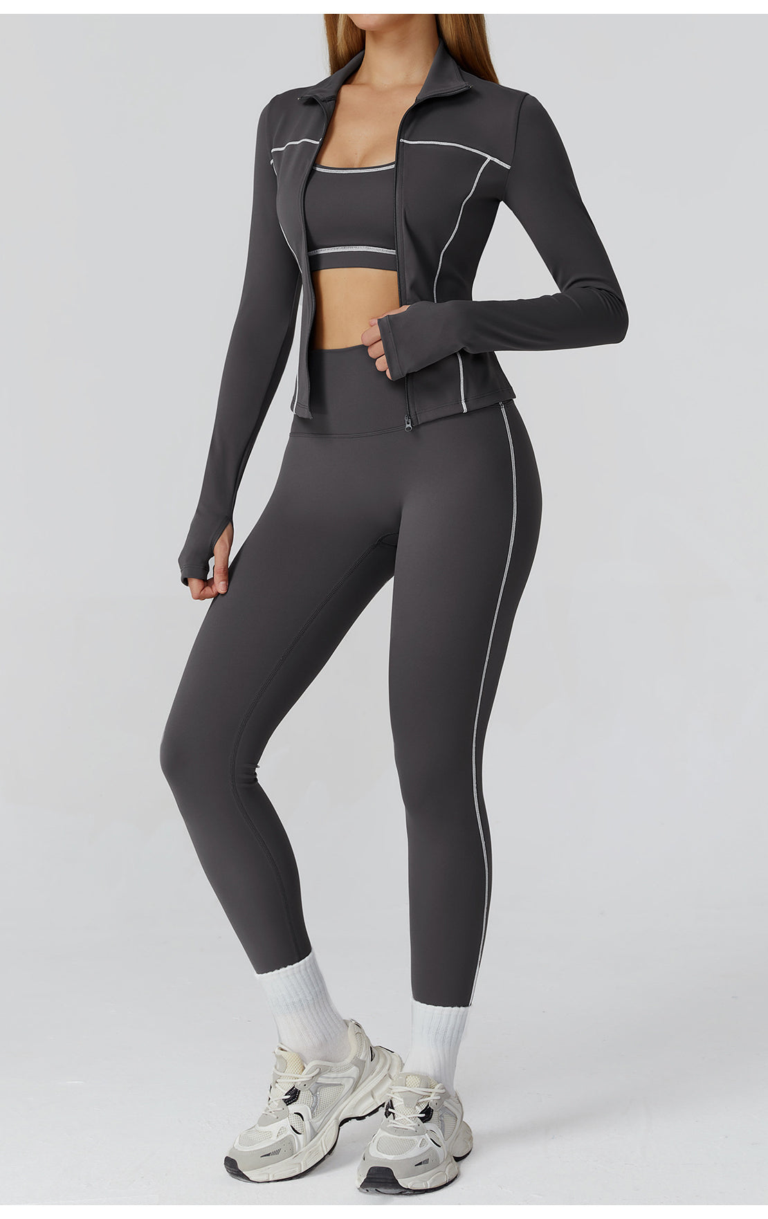 Charcoal gray Langry fashion leggings with white piping, zipper detail, Lululemon athletic wear