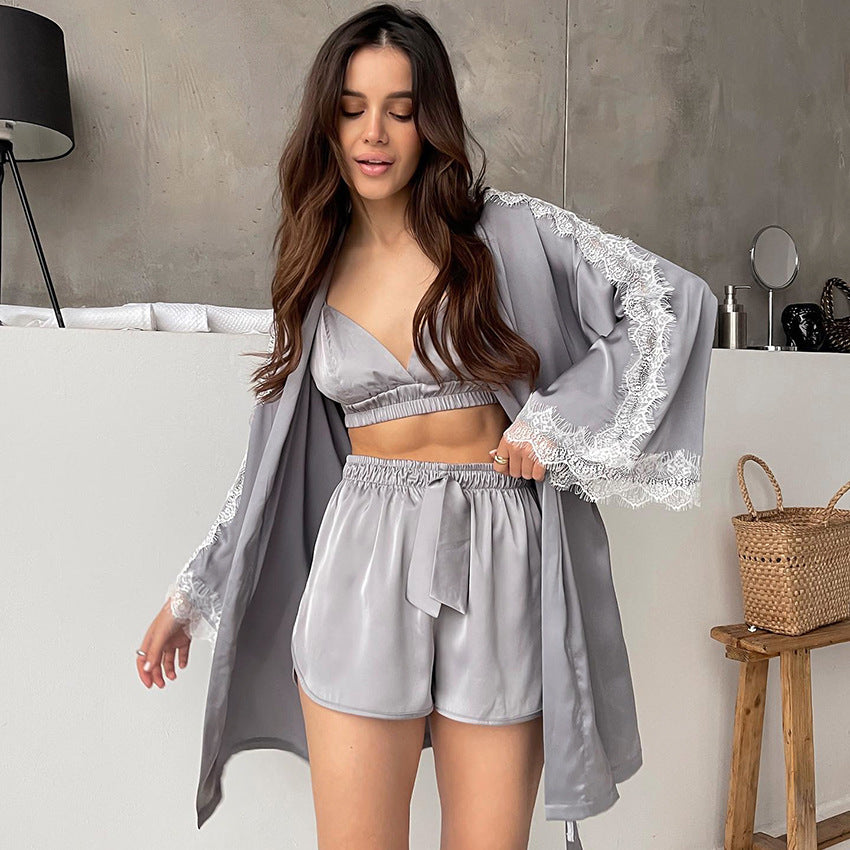 Woman modeling Comfy Shorts Satin Three Piece Set with lace-trimmed robe and bralette