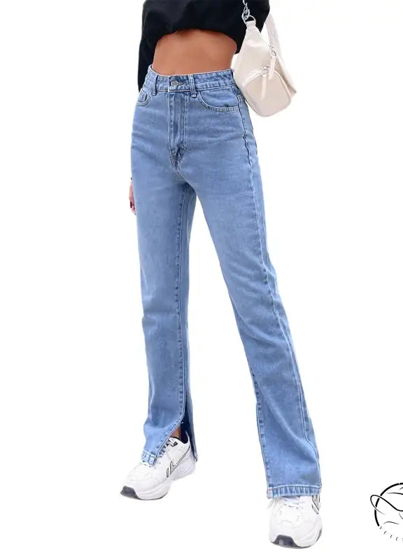 Light blue high-waisted straight-leg denim pants with ankle slits