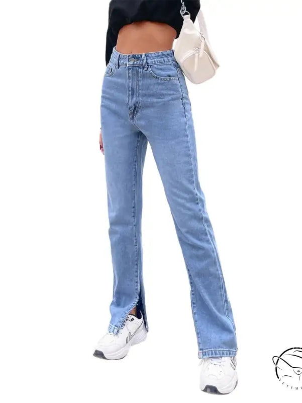 Light blue high-waisted straight-leg denim pants with ankle slits