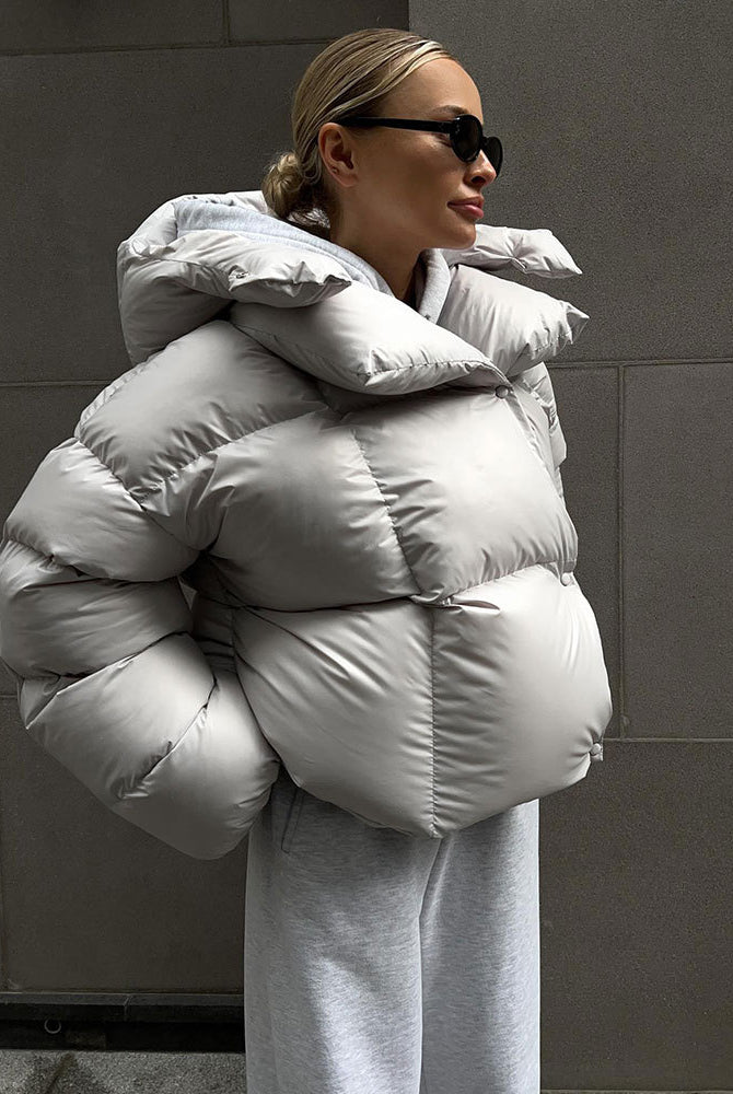 Oversized silver puffer jacket from Langry, a stylish option in ملابس fashion