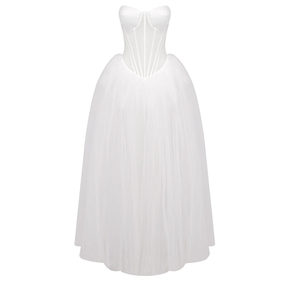 Classic white strapless wedding gown with tulle skirt, ideal for elegant fashion ensembles