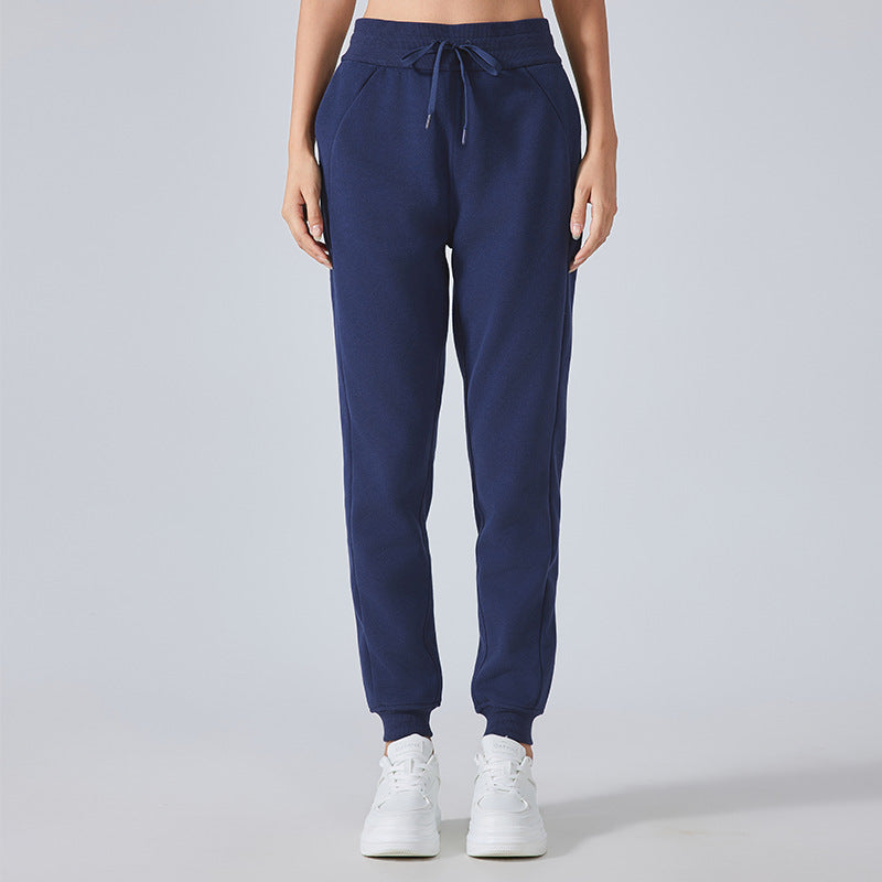 Navy blue jogger sweatpants with elastic cuffs, ideal for autumn winter fashion ملابس