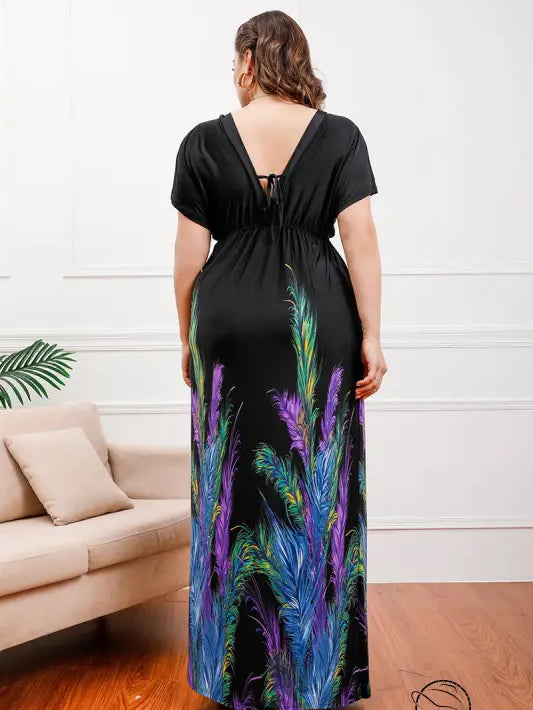 Black holiday beach dress with feather print