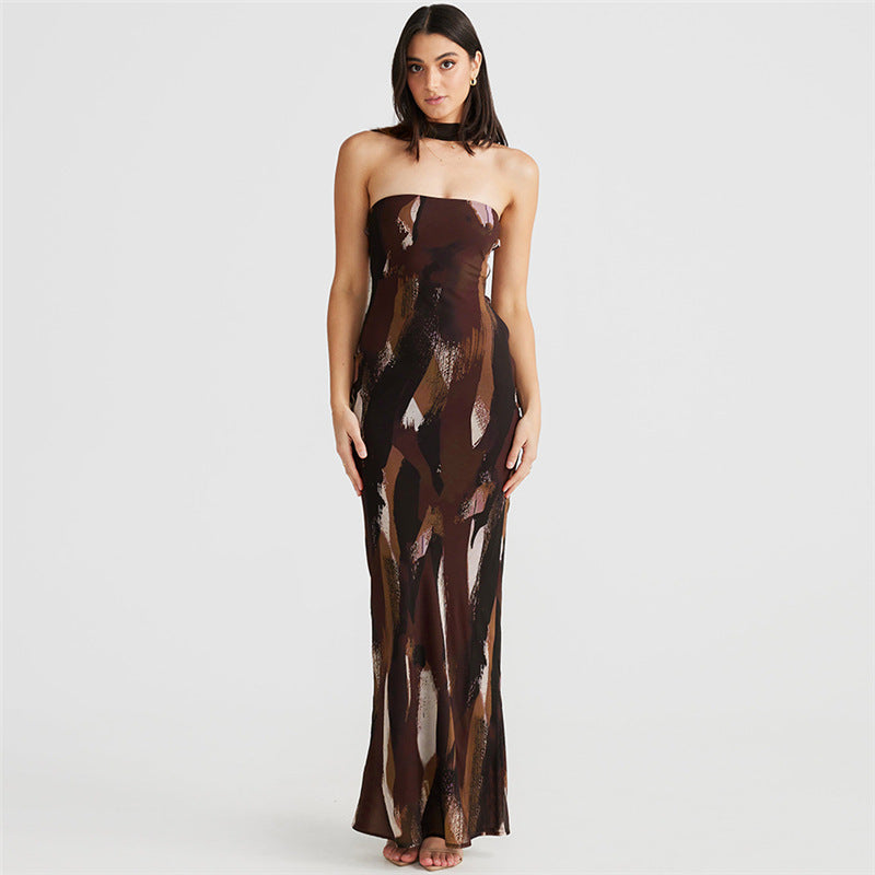 Strapless brown maxi dress featuring metallic brushstroke patterns in fashion design