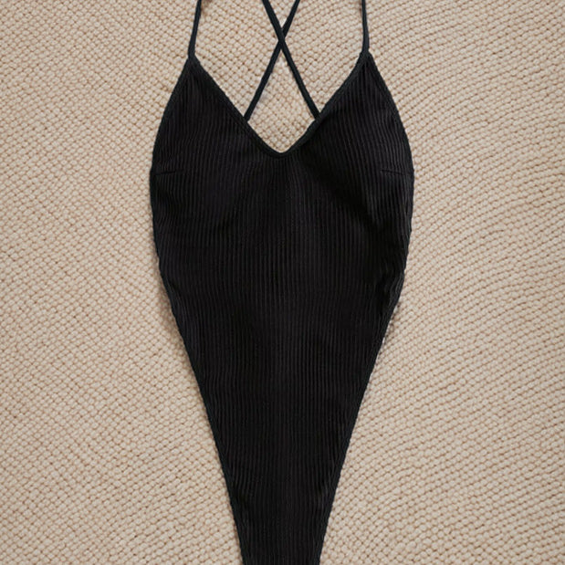 Black ribbed one-piece swimsuit with crossed back straps for stylish summer fashion