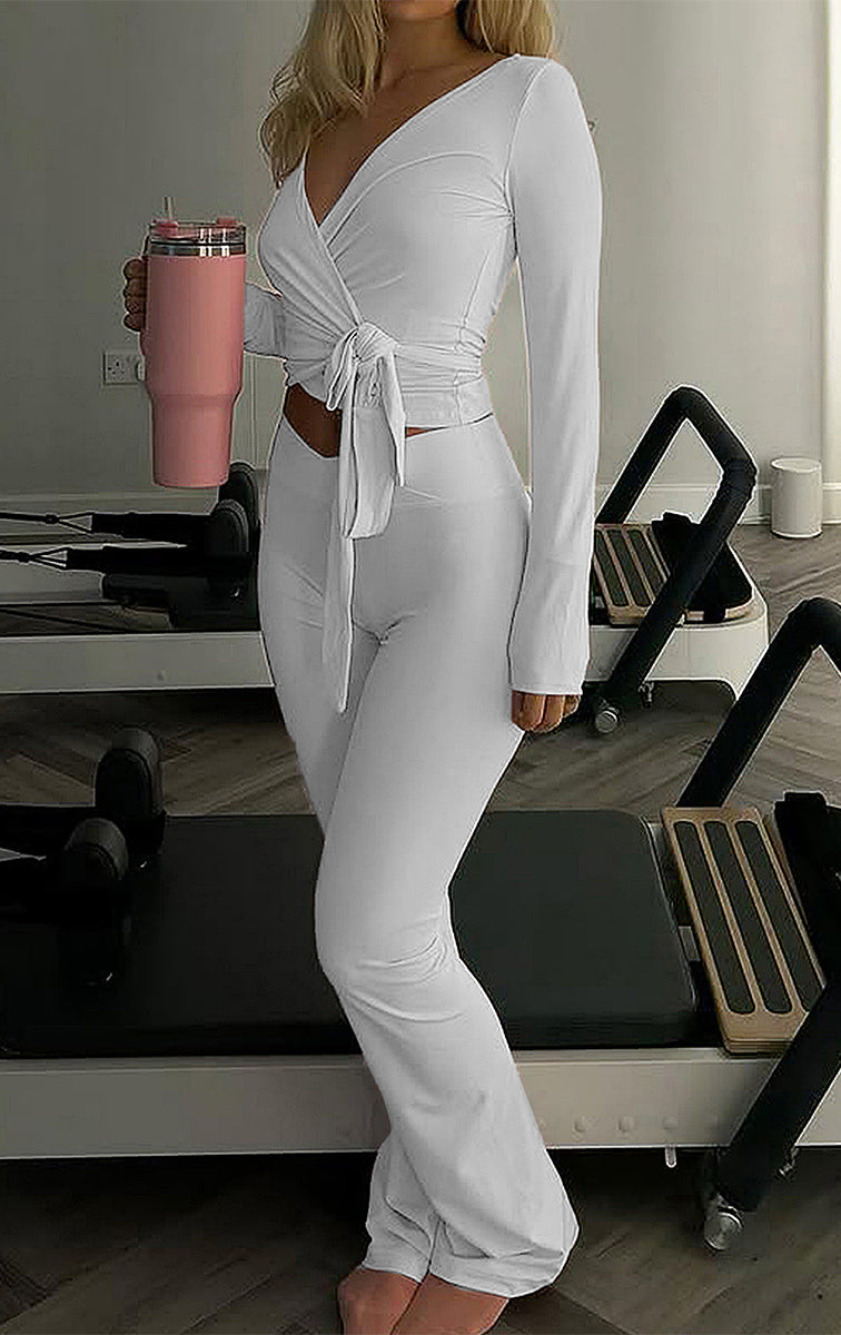 White langry fashion ملابس: long-sleeved wrap top and flared pants set