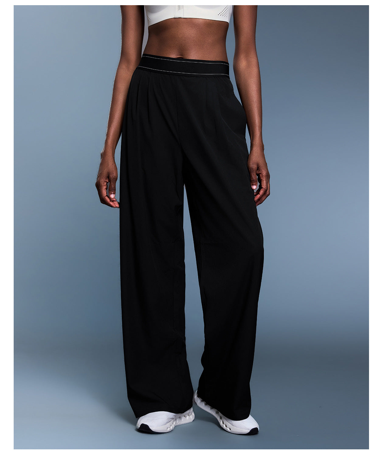 Black wide-leg langry fashion pants with white piping and elastic waistband