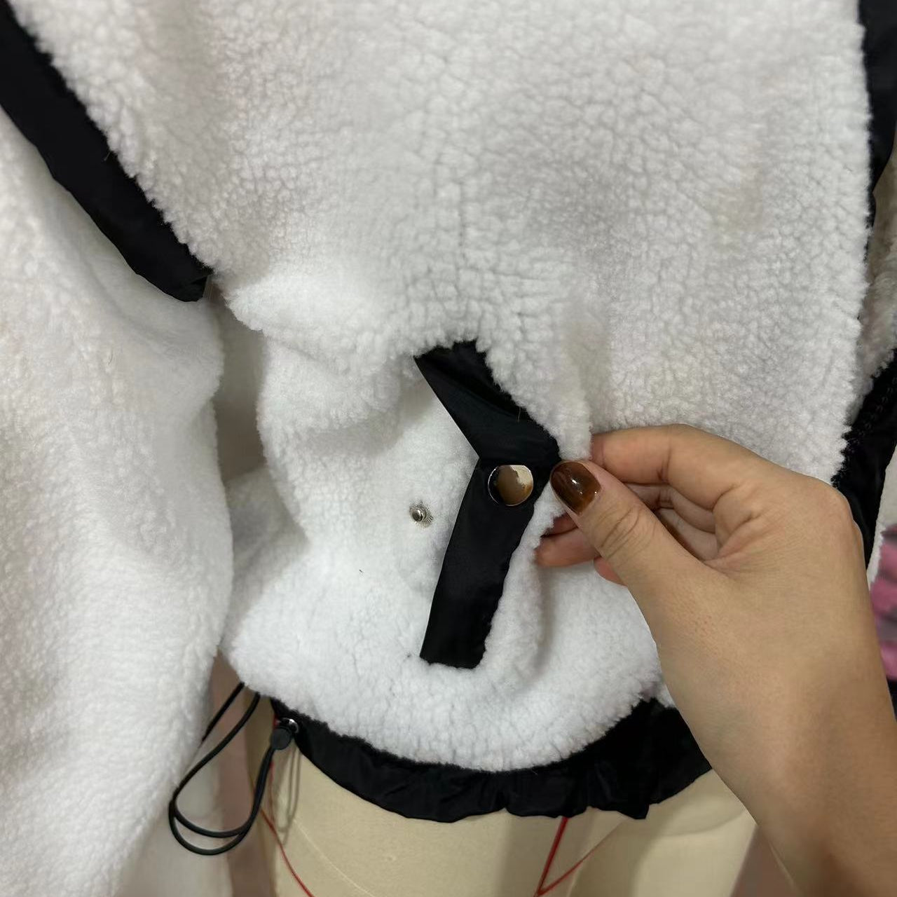 White fleece jacket with black trim from the Langry fashion Outdoor Lambswool Cardigan