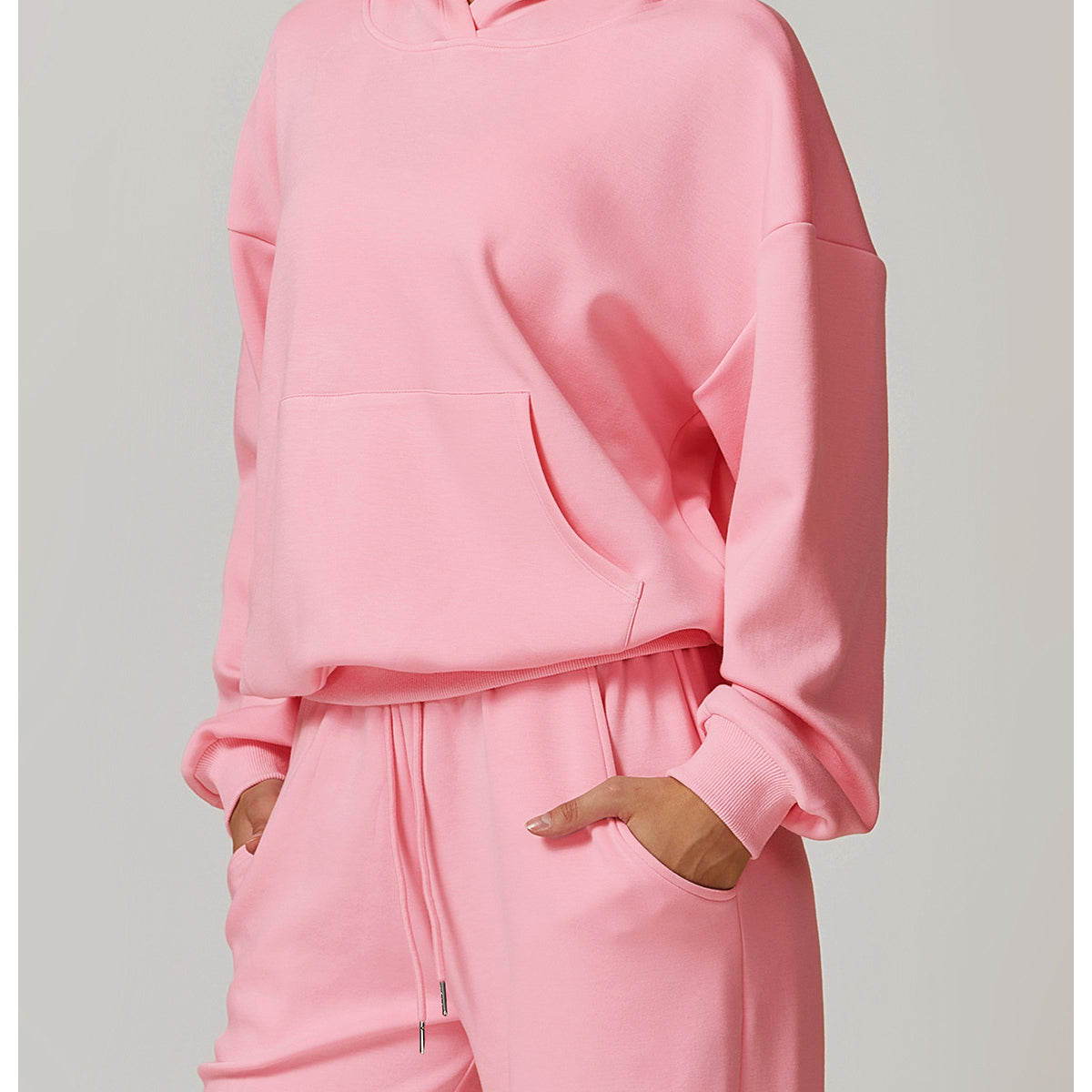 Pink hooded sweatshirt and sweatpants set from Langry, ideal for fashionable casual wear