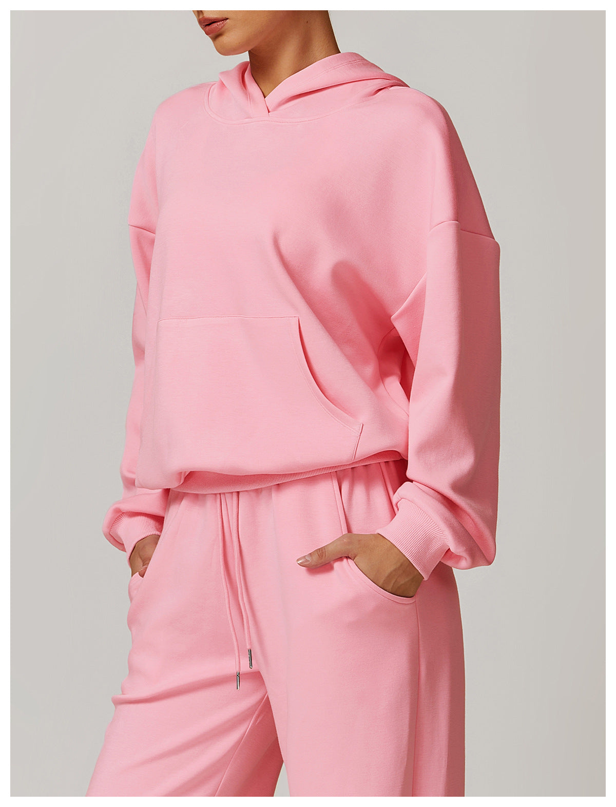 Pink hooded sweatshirt and sweatpants set from Langry, ideal for fashionable casual wear