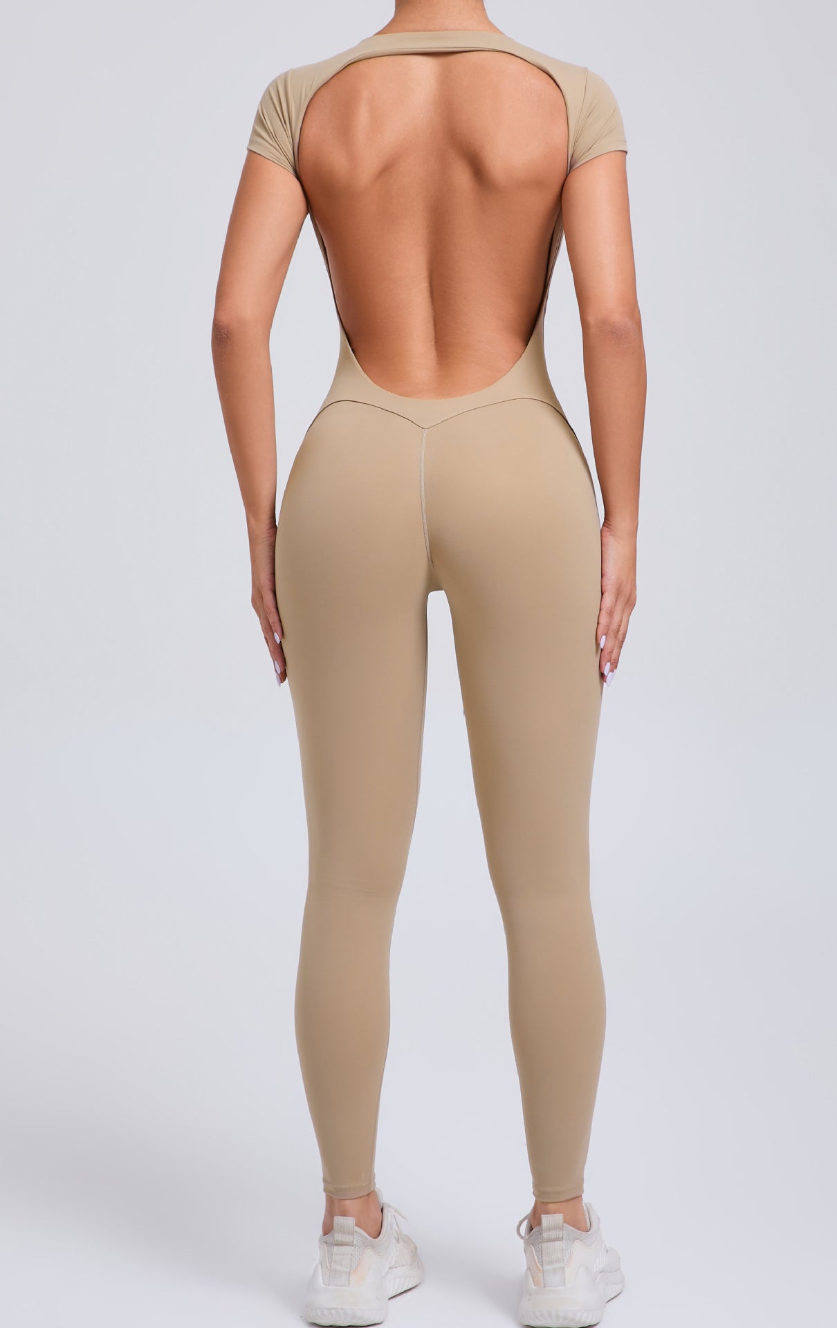 Beige langry backless yoga bodysuit for fashion ملابس