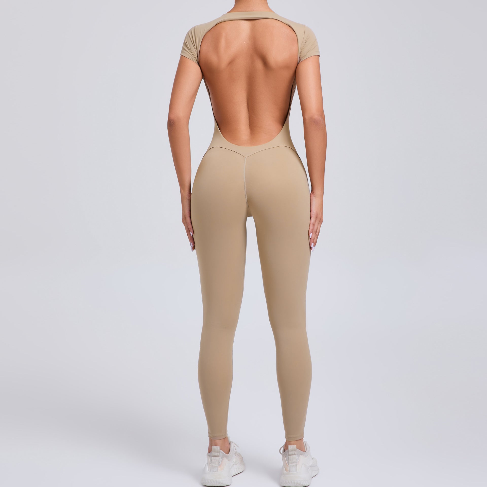 Beige langry backless yoga bodysuit for fashion ملابس