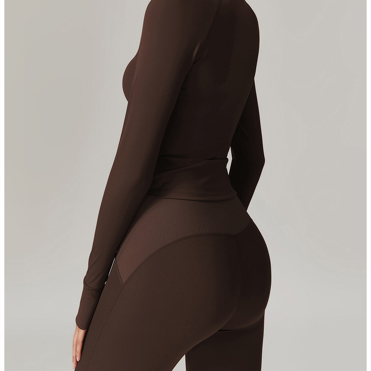 Brown langry athletic wear set featuring long sleeves and leggings for fashion enthusiasts