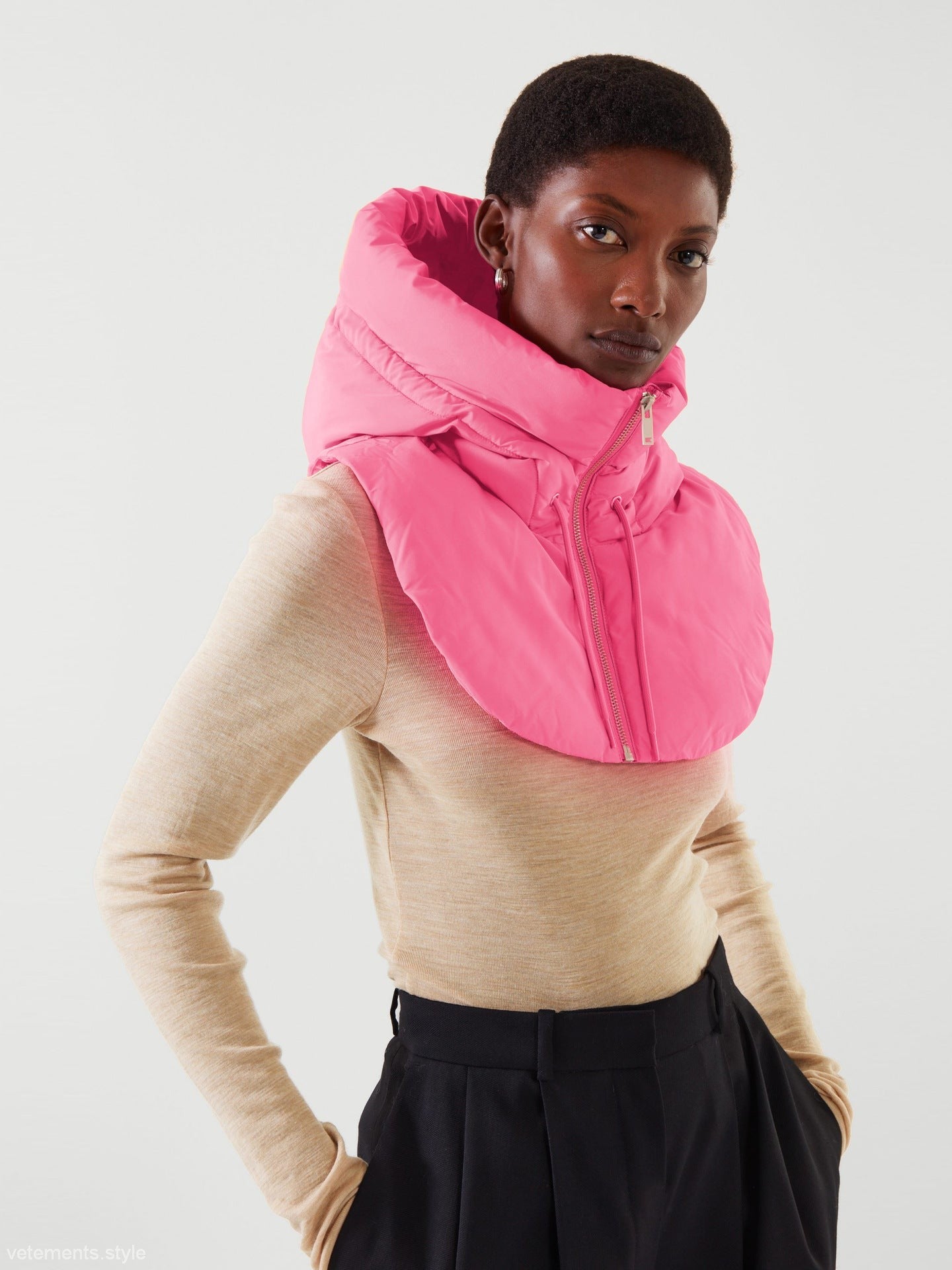 Bright pink puffer hood from the Hooded Accessories collection, ideal for autumn winter accessories
