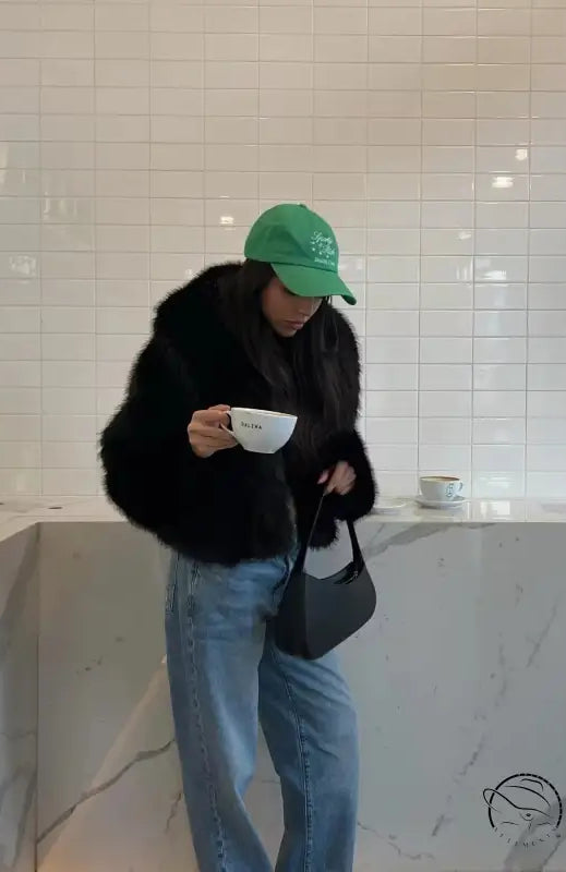 Gorgeous faux fur fox jacket with Langry green cap and leather bag