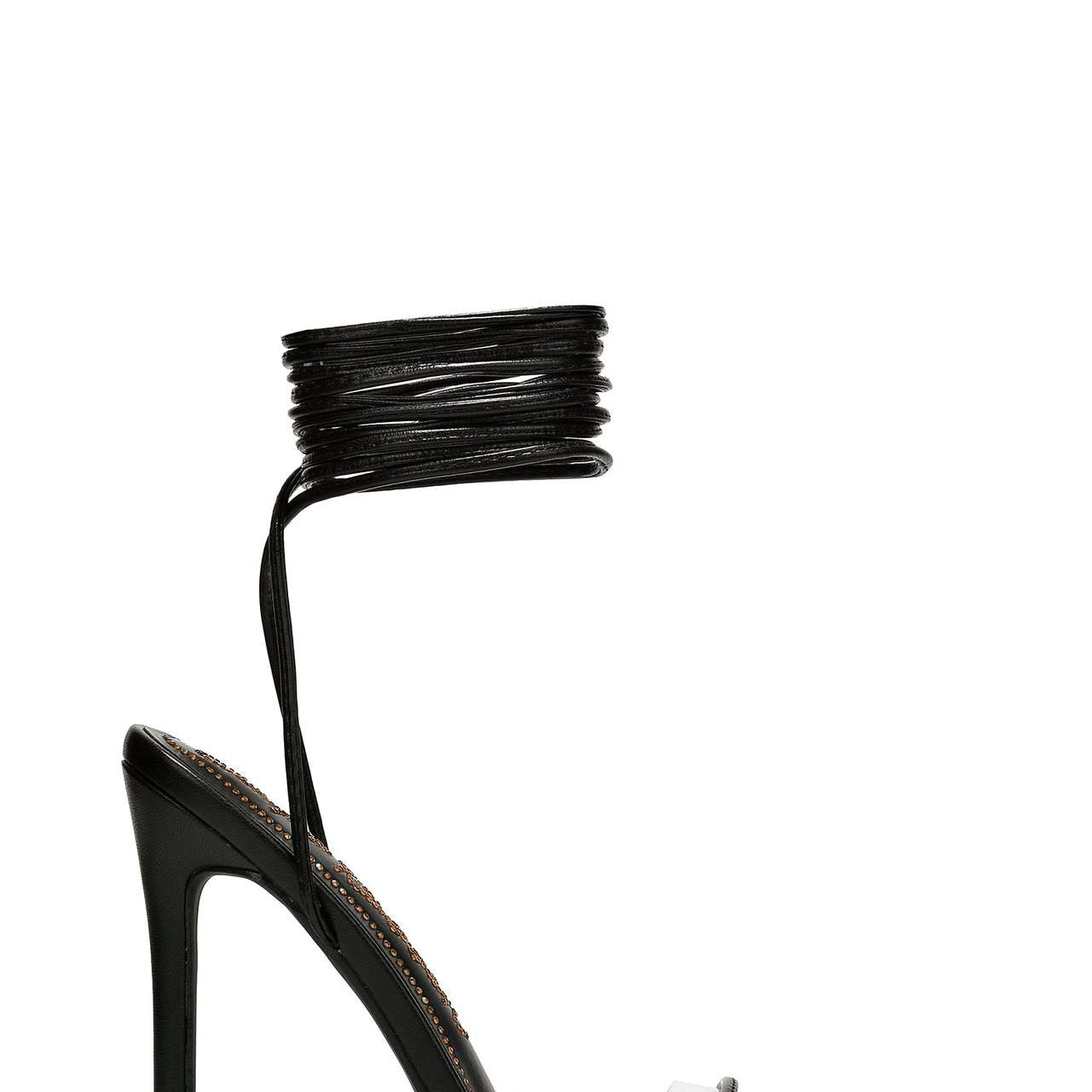 Elegant black stiletto heel with ankle wrap, perfect for fashion and ملابس statements