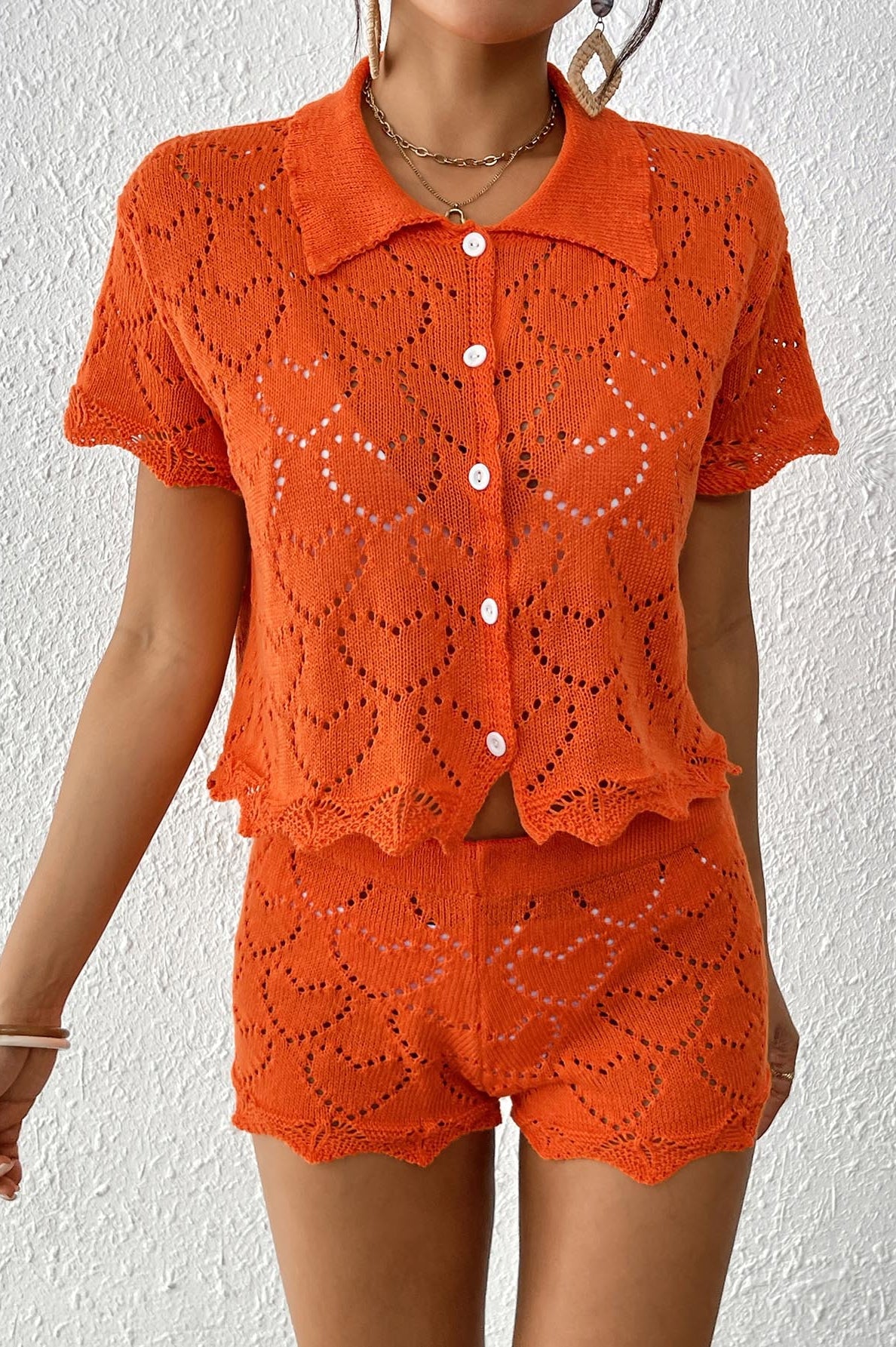 Orange knit shorts and top set from Beautiful Beach Sets, perfect for summer fashion