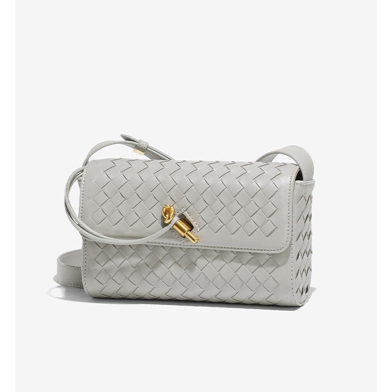 Gray woven crossbody bag with gold clasp, perfect for langry fashion and stylish ملابس