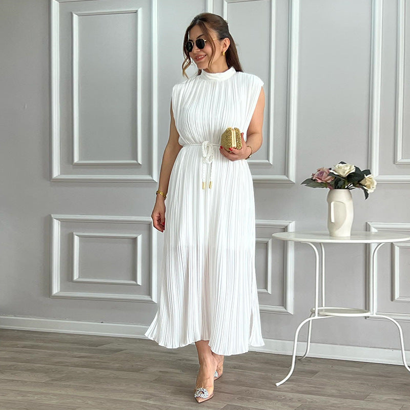 White pleated midi dress featuring waist control, stylish fashion ملابس for elegant occasions