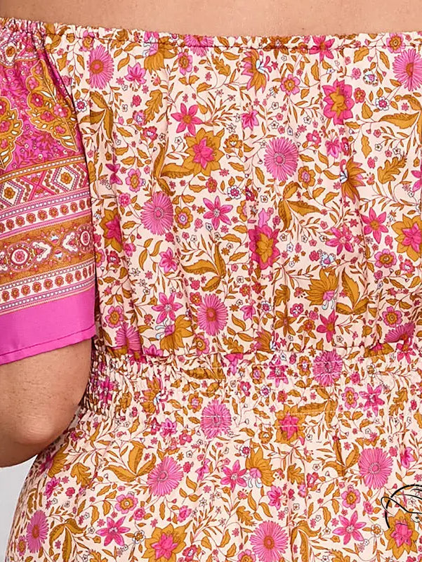 Elegant bohemian dress with floral off-shoulder top and smocked waist