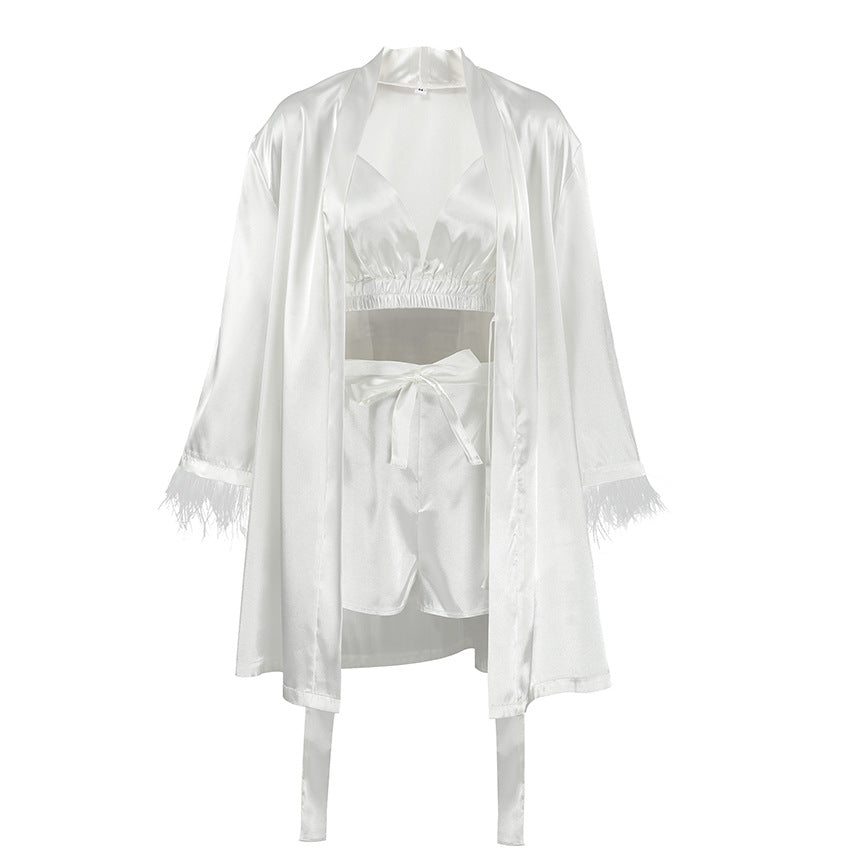 White satin three-piece pajama set with robe, crop top, and shorts for comfortable silk feather nightwear