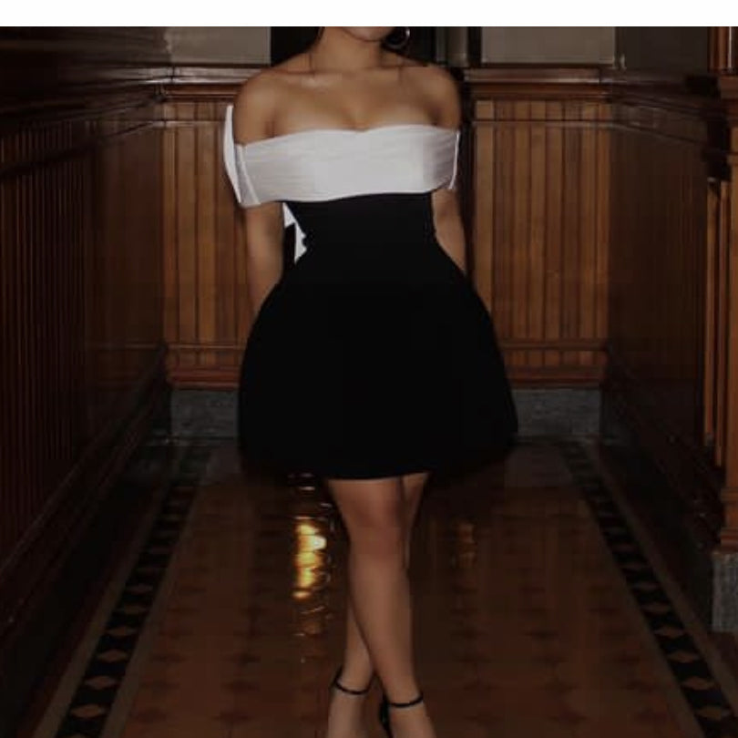 Elegant off-the-shoulder black and white dress from Black White Swing Design Bow Dress, perfect for fashion enthusiasts and ملابس