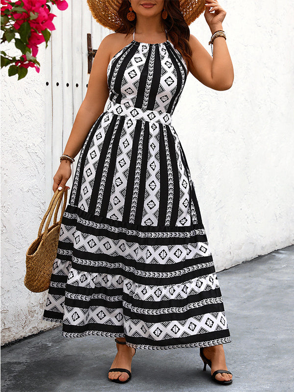 Black and white patterned halter maxi dress showcasing elegant fashion and luxurious style