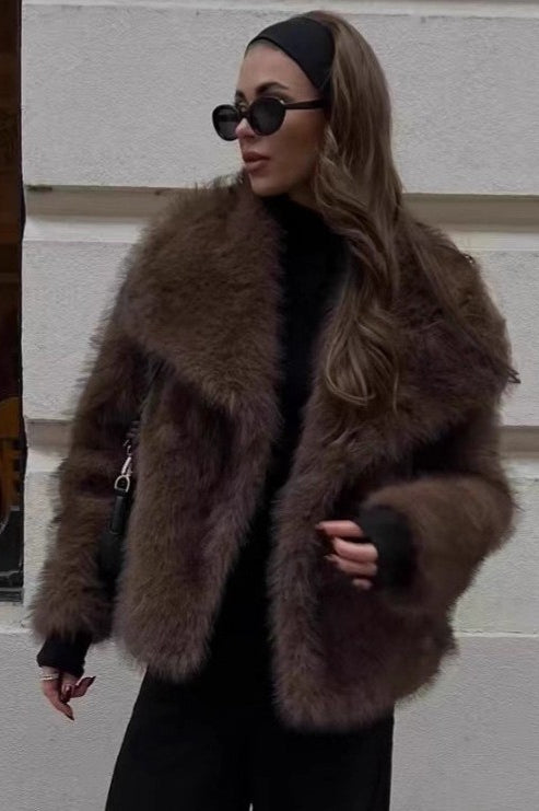 Elegant faux fur fox coat in brown with black trim and cuffs