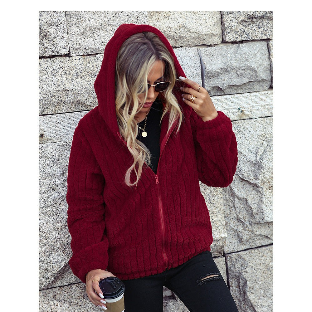 Gorgeous red hooded fleece jacket featuring a hooded long sleeve and loose fit design