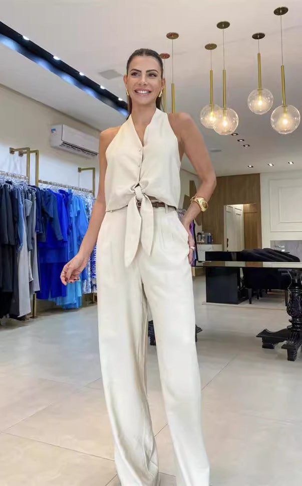 Woman’s cream-colored halter jumpsuit from Elegant Office Jumpsuit Set, stylish ملابس fashion