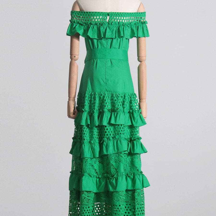 Green off-the-shoulder ruffled maxi dress showcasing elegant langry fashion and ملابس style