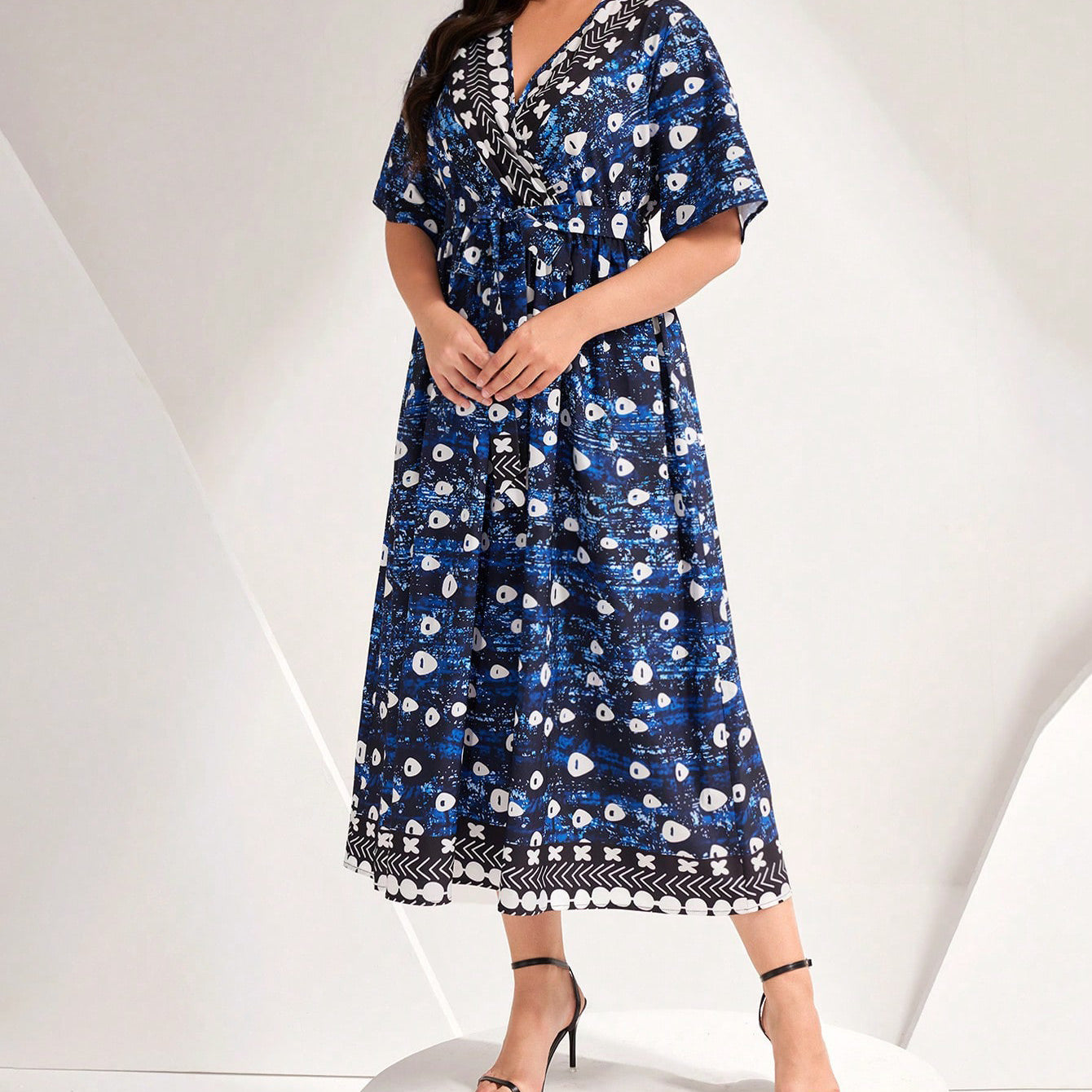 Beautiful Blue Printed Tied Dress showcasing a stylish floral print for fashionable women