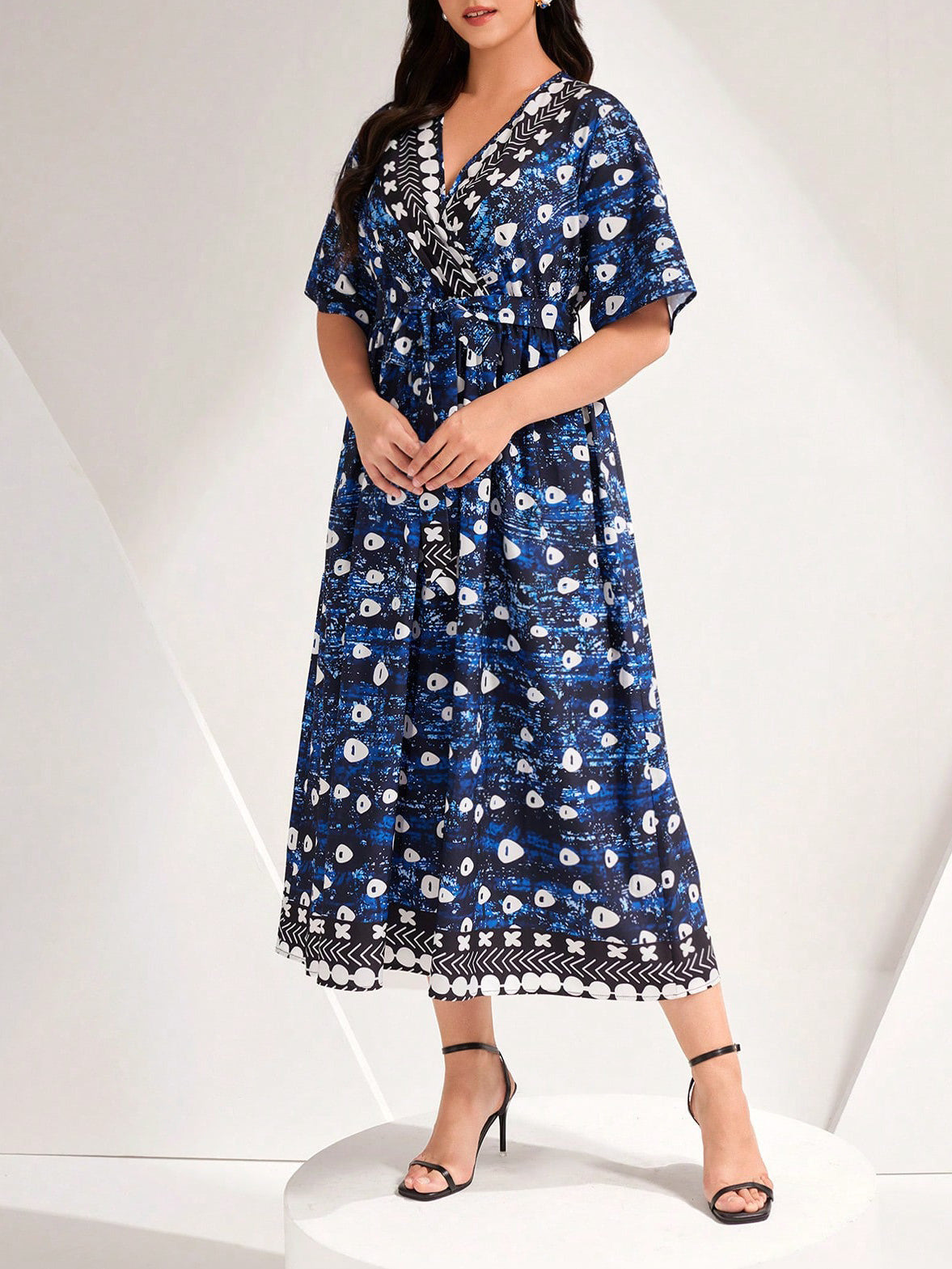 Beautiful Blue Printed Tied Dress showcasing a stylish floral print for fashionable women