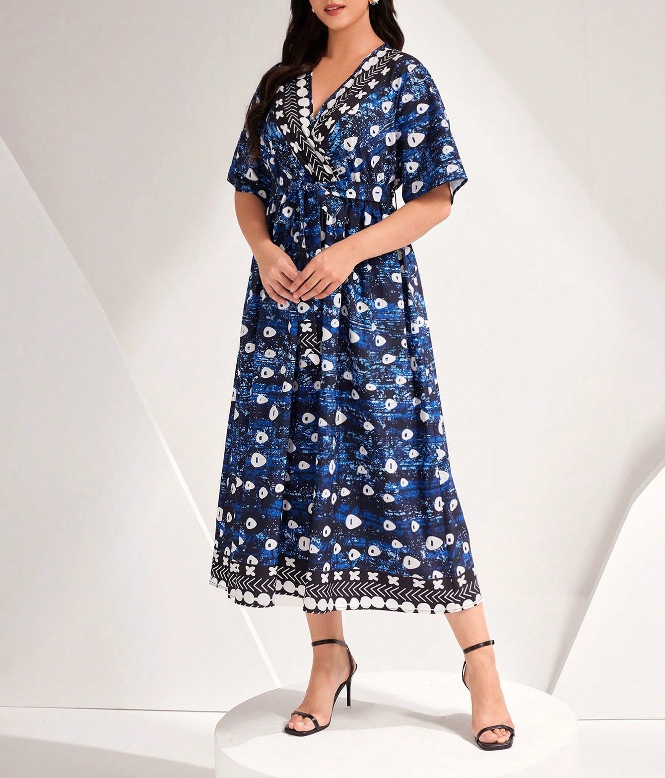 Beautiful Blue Printed Tied Dress showcasing a stylish floral print for fashionable women