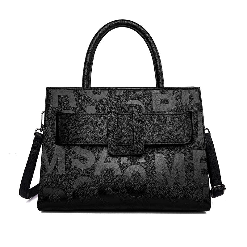 Black leather handbag with text pattern, perfect for fashion enthusiasts and ملابس lovers