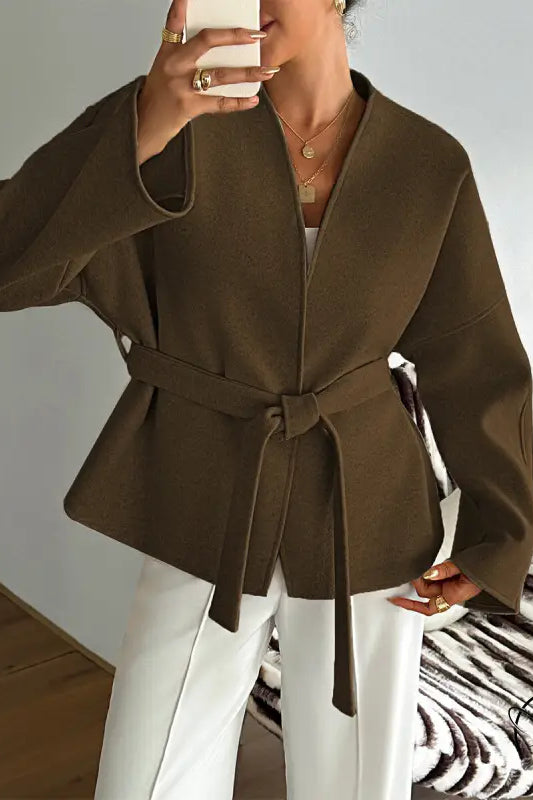 Olive green belted blazer with wide sleeves and notched lapels in langry fashion