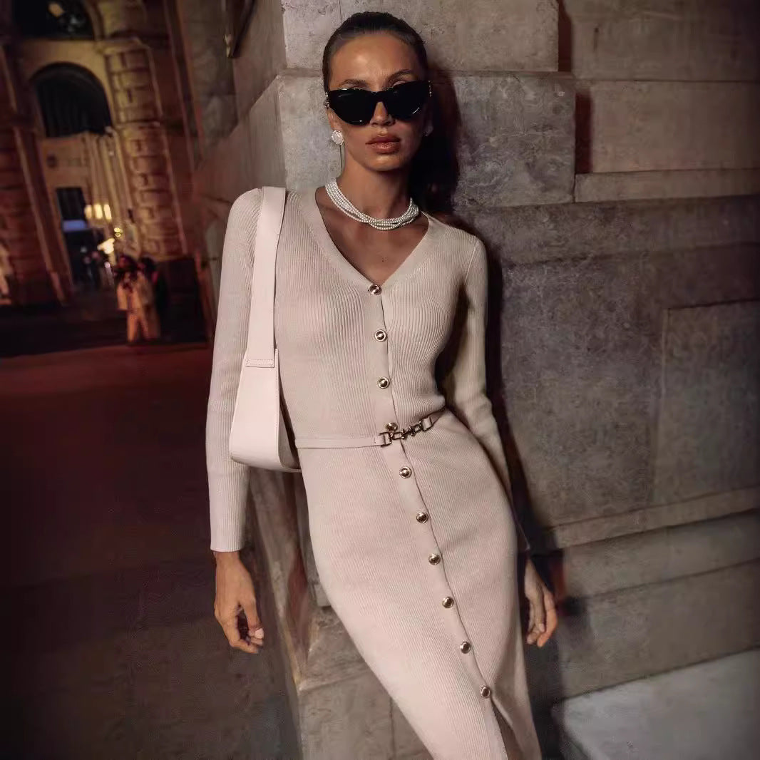 Woman in beige long sleeve knitted dress showcasing elegant fashion style