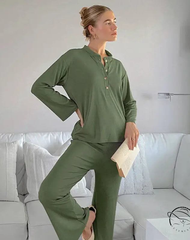 Woman in knitted stripe comfortable home wear, olive green outfit