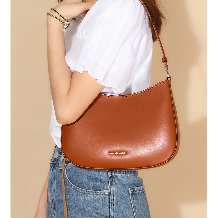 Brown leather shoulder bag from Special Interest Design Bag, perfect for stylish fashion and ملابس