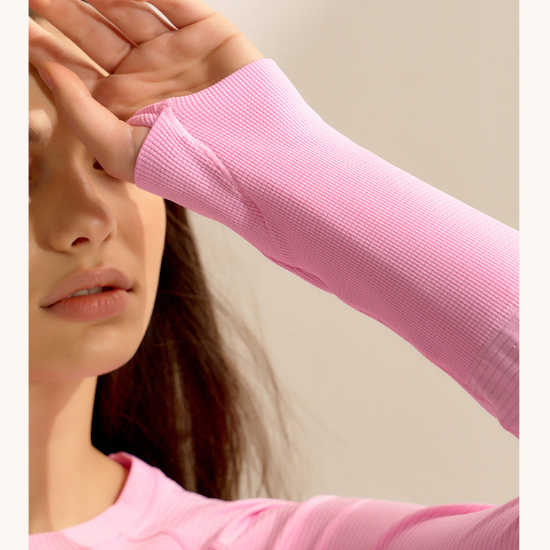 Pink knit sweater sleeve with ribbed cuff detail for stylish running fitness tops