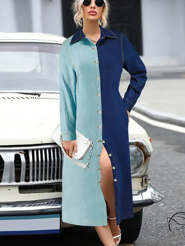 Woman modeling beautiful denim stitching dress in two-tone blue with high slit