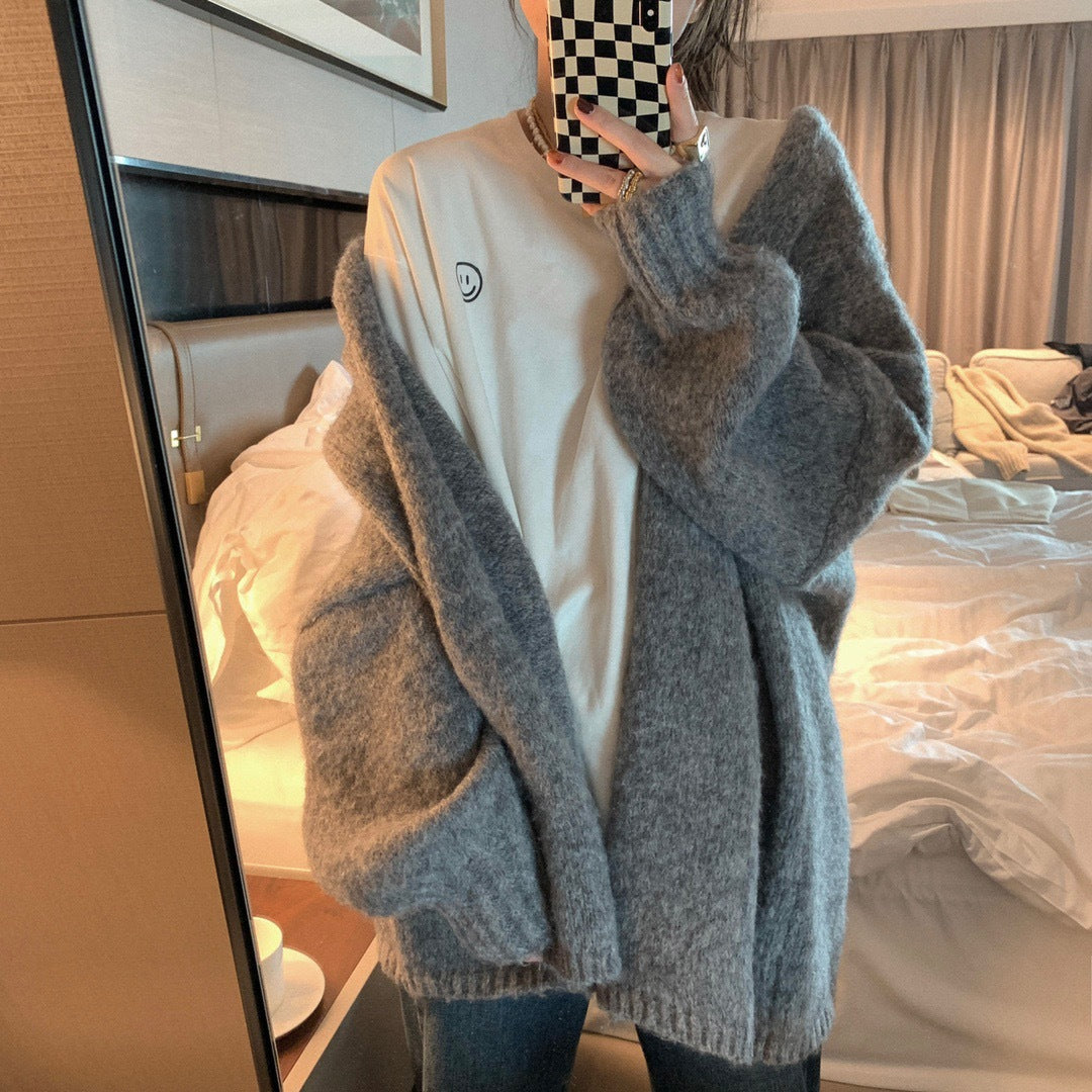 Gray oversized knit cardigan with long sleeves from Gentle Mid Length Knitted Coat, perfect for fashion