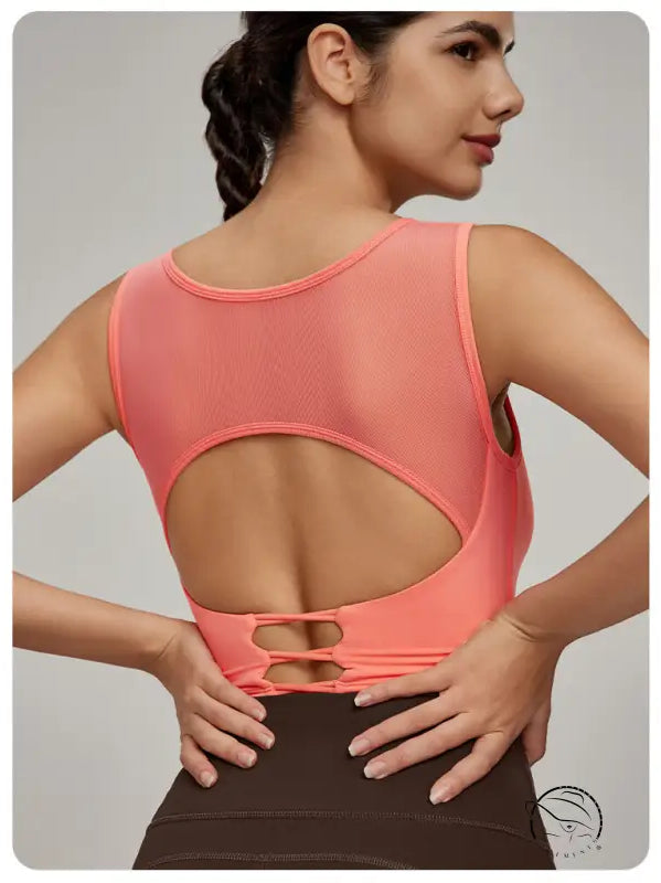 Beauty Back Mesh Workout Top in coral with mesh back and cut-out detail