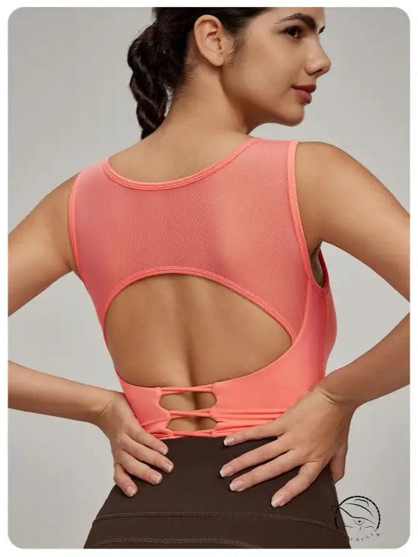 Beauty Back Mesh Workout Top in coral with mesh back and cut-out detail