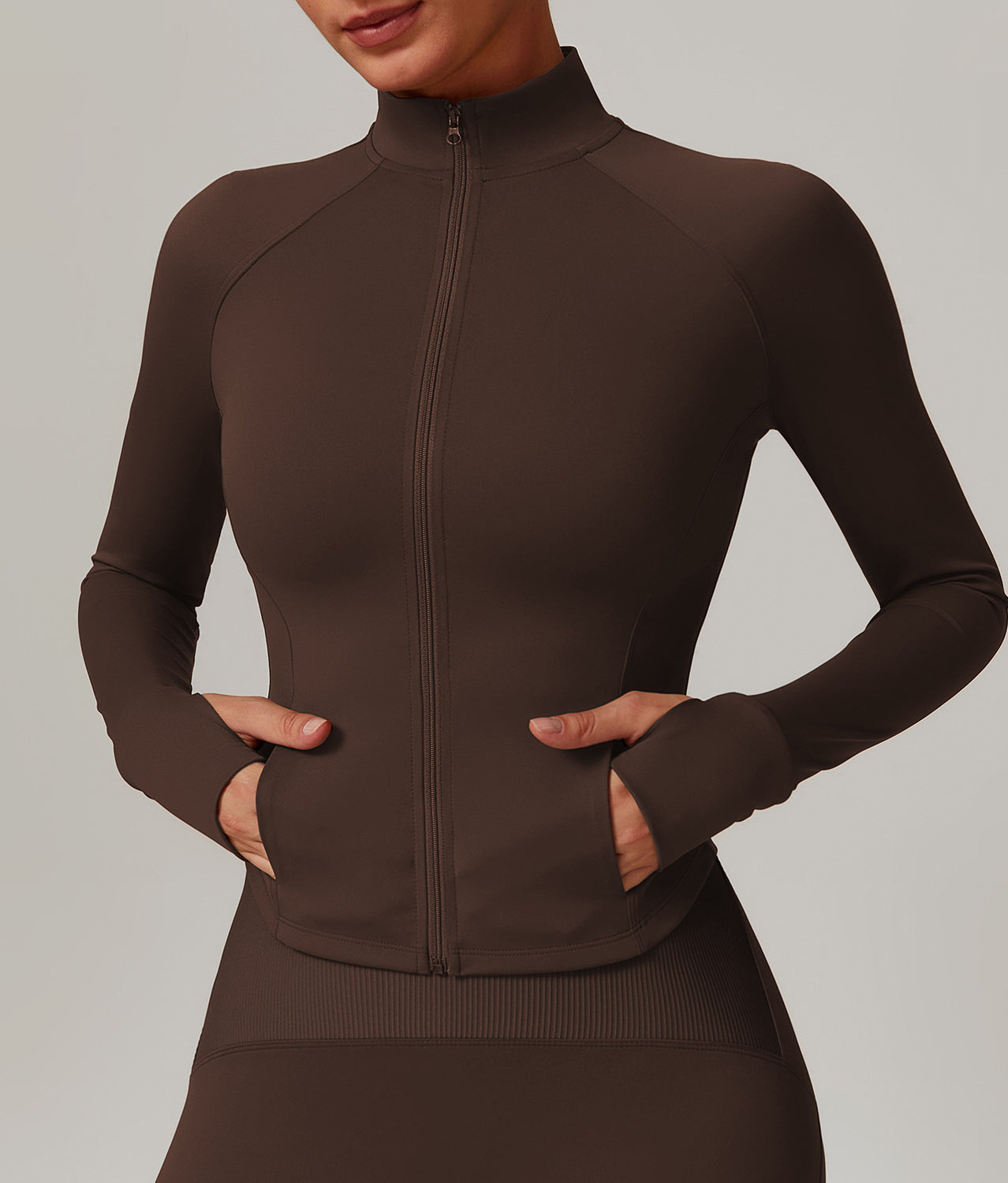 Brown zip-up athletic jacket with mock turtleneck, ideal for langry fashion ملابس