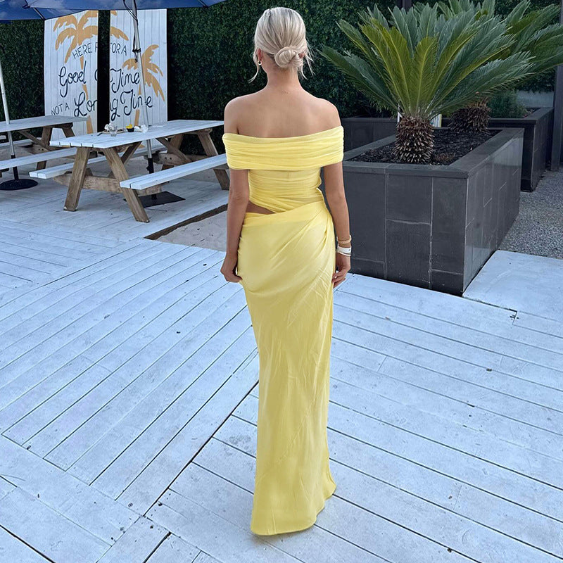 Yellow off-shoulder maxi dress with fitted silhouette, perfect for elegant evening wear